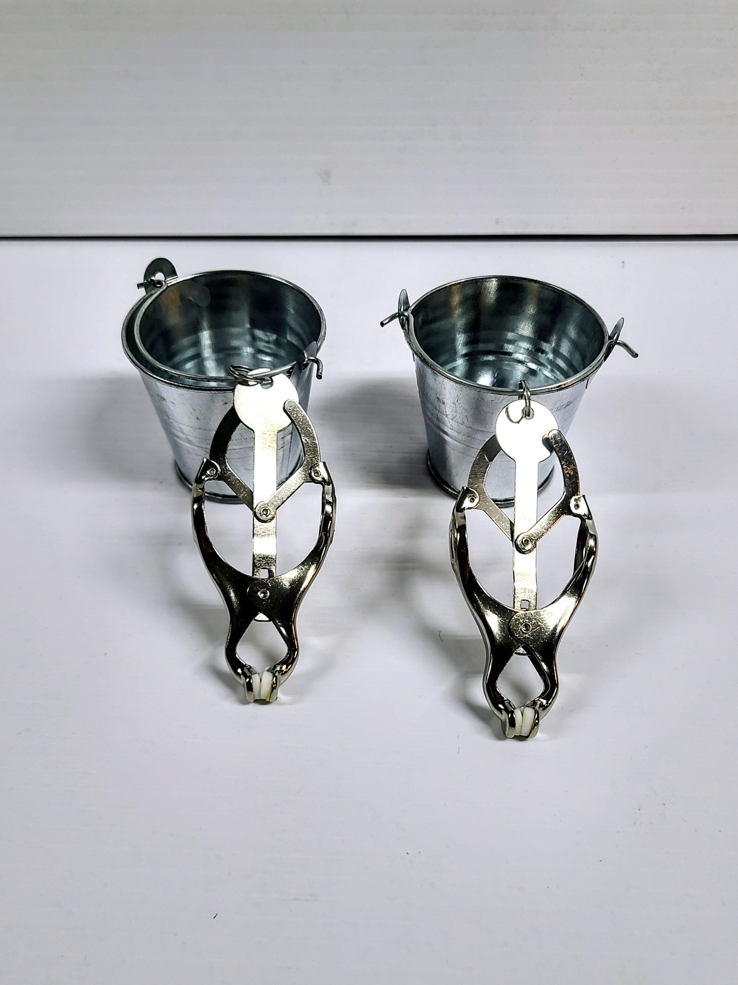 Steel Bucket Nipple Clamps