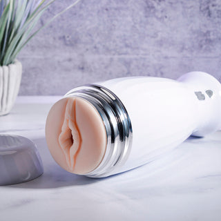 Zero Tolerance THE THRUSTING RECHARGEABLE STROKER  WHITE/CHROME